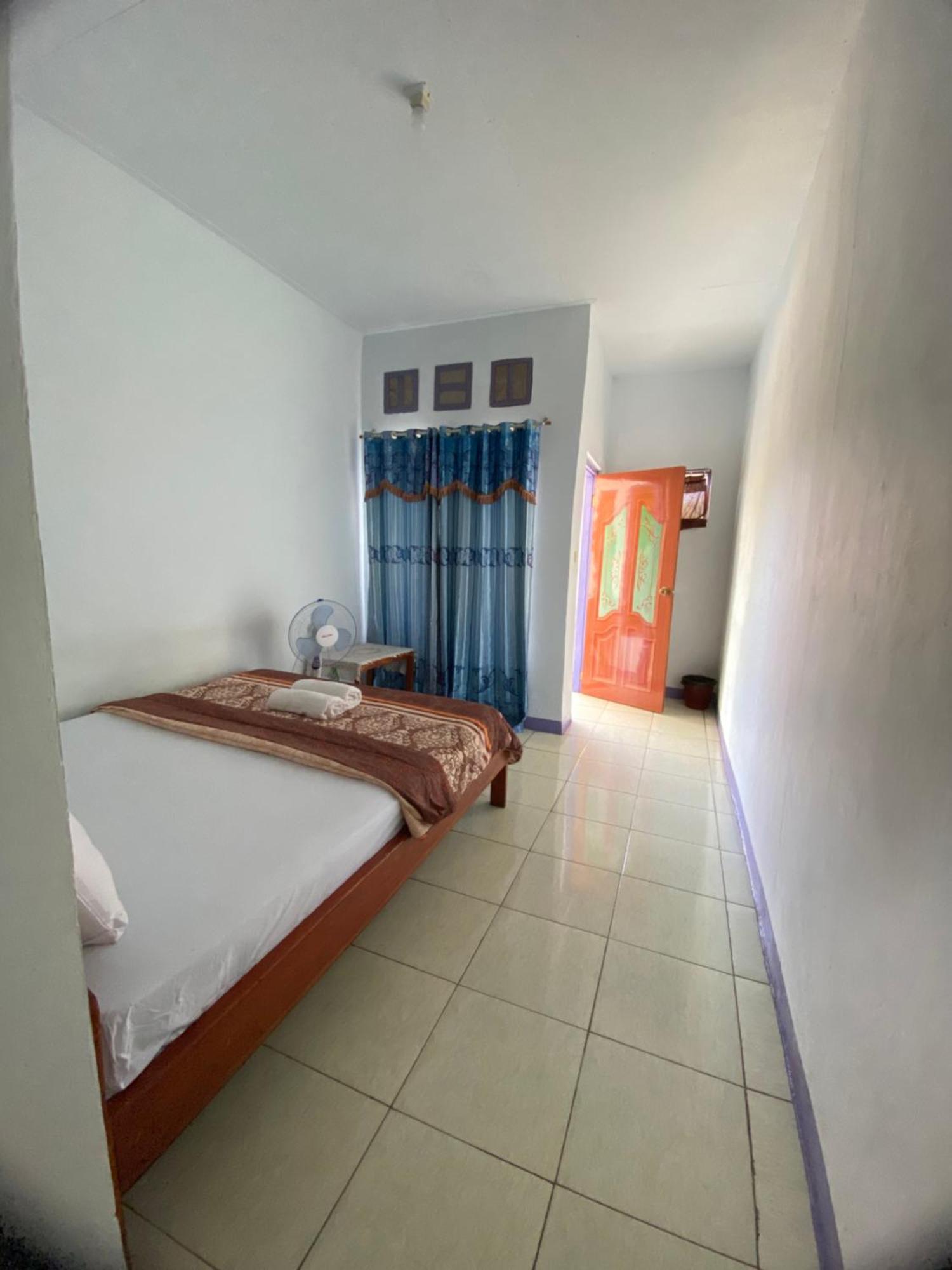 Mahoni Guest House Kelimutu Bagian luar foto